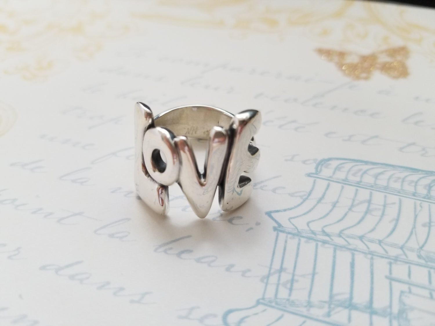 Love ring in bubble letters