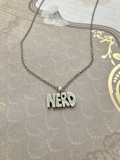 NERD Pendant in Sterling Silver